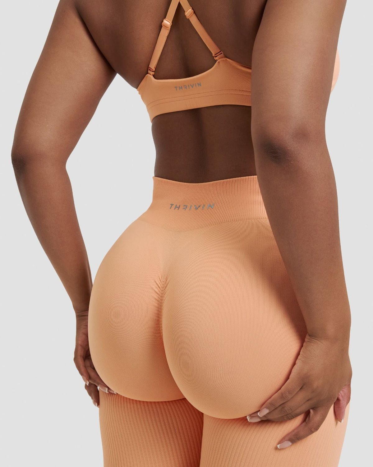 RiseFit Sculpting Mid Waist Scrunch Leggings Melon Ice