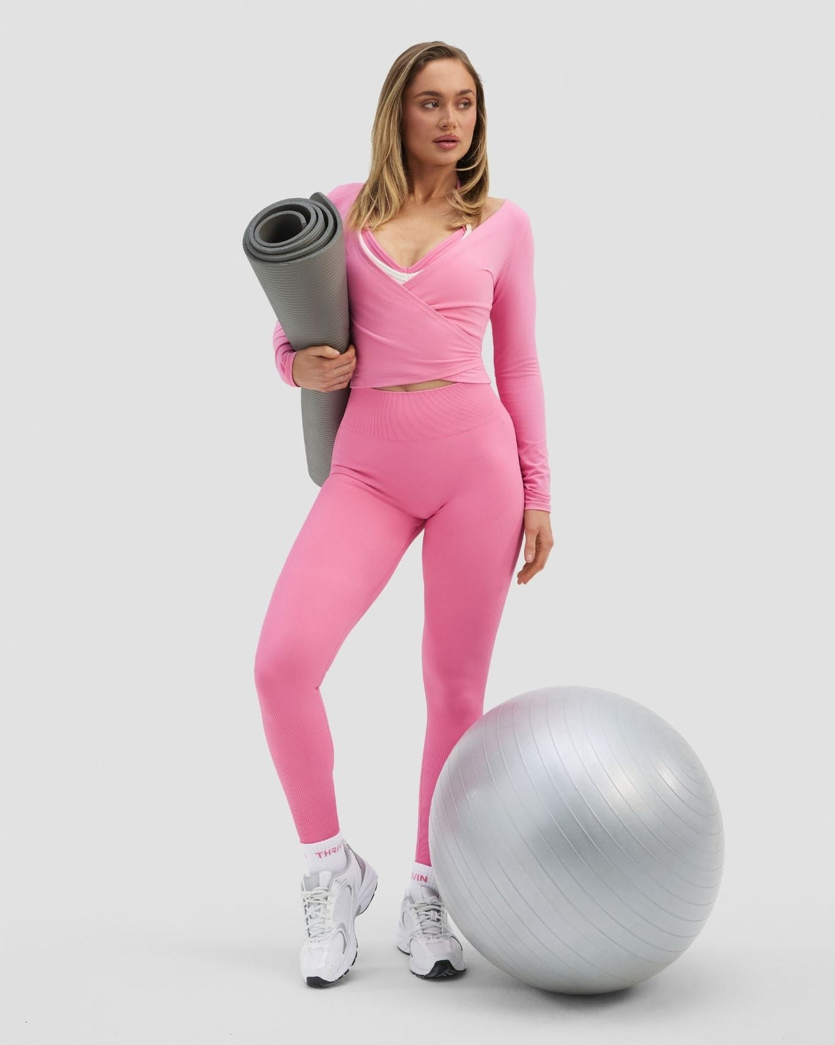 Elevate™ Sculpting Seamless Adjustable Halter Bra | Bubble Pink
