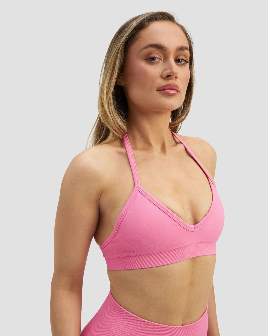 Elevate™ Sculpting Seamless Adjustable Halter Bra | Bubble Pink