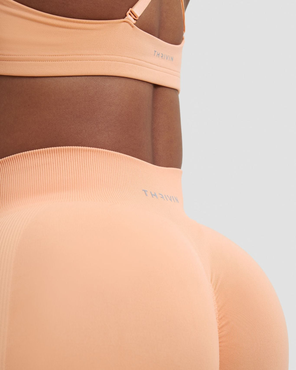 RiseFit Sculpting Mid Waist Scrunch Leggings Melon Ice